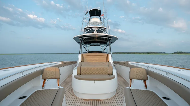 Slide: The Image of Spacious Bow Seating Area The bow of the MarMar V-46 by Valhalla Boatworks showcases a luxurious seating arrangement with plush, diamond-stitched upholstery. The expansive layout provides ample space for relaxation while cruising, complemented by elegant teak decking that enhances - 7162281