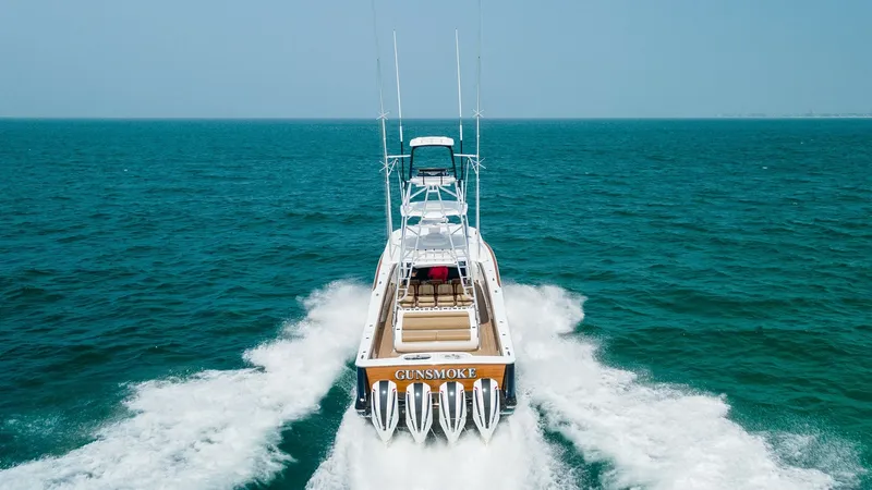 Slide: The Image of Aft Deck and Quad Engines in Motion This dynamic image showcases the aft deck of the 2022 Valhalla Boatworks V-46, featuring ample seating and a sleek design. The powerful quad engines propel the vessel effortlessly through the open sea, creating an exhilarating wake. This view highlights t - 6845097