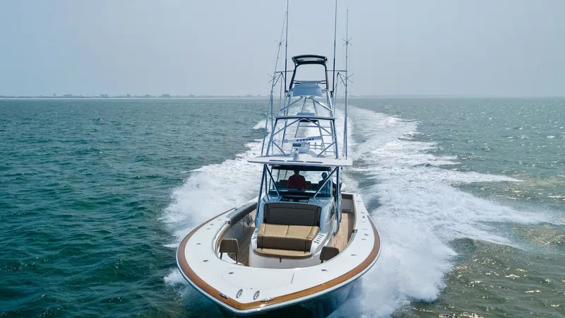 Slide: The Image of Bow View with Tower and Seating Experience the sleek elegance of the MarMar V-46 with this stunning bow view, showcasing the vessel's sophisticated design by Valhalla Boatworks. The open deck features plush seating, perfect for relaxation while cruising. The prominent tower adds a sport - 6845094