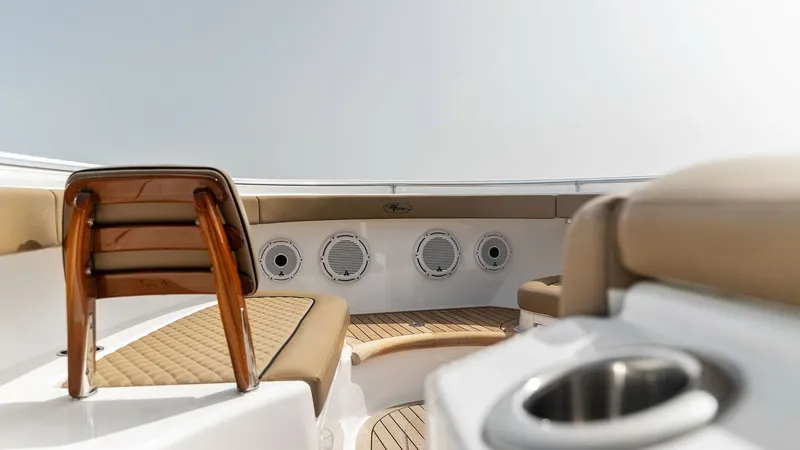 Slide: The Image of Spacious Bow Seating Area The bow of the 2022 MarMar V-46 by Valhalla Boatworks features plush, tan upholstered seating, offering a comfortable and inviting space for relaxation. The deck is elegantly finished with teak flooring, enhancing the vessel's luxurious appeal. Notable ar - 6845064