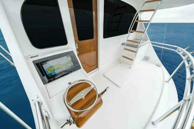 Slide: The Image of Viking 82 Skybridge - Helm on Exterior Enclosed Bridge 2027 Viking 82 Skybridge - 6844579
