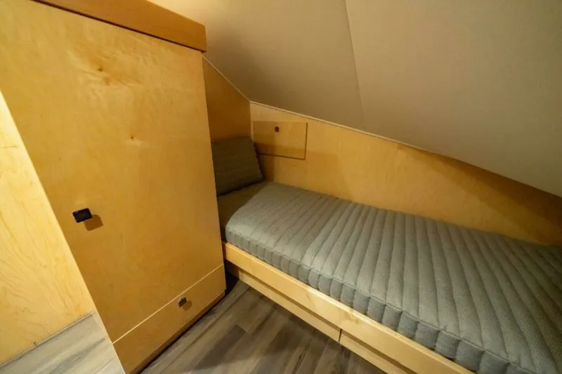 Slide: The Image of Viking 82 Convertible - Pantry Storage with Crew bed 2027 Viking 82 Convertible - 7657241