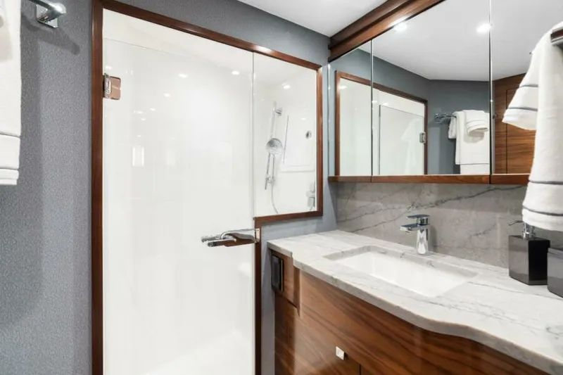 Slide: The Image of Viking 74 Convertible - Master Stateroom Ensuite head 2027 Viking 74 Convertible - 6844636