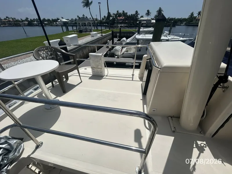 Slide: The Image of 40' Mainship sundeck port - 6848158