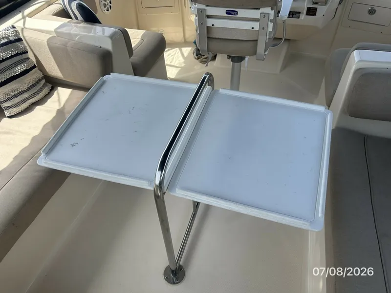 Slide: The Image of 40' Mainship flybridge table - 6848110