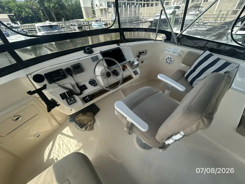 Slide: The Image of 40' Mainship flybridge helm2 - 6848101
