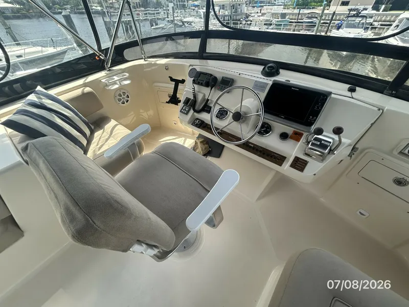 Slide: The Image of 40' Mainship flybridge helm1 - 6848100