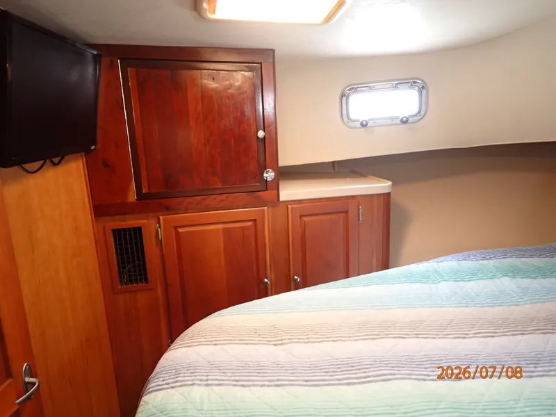 Slide: The Image of 40' Mainship master stateroom port - 6848131