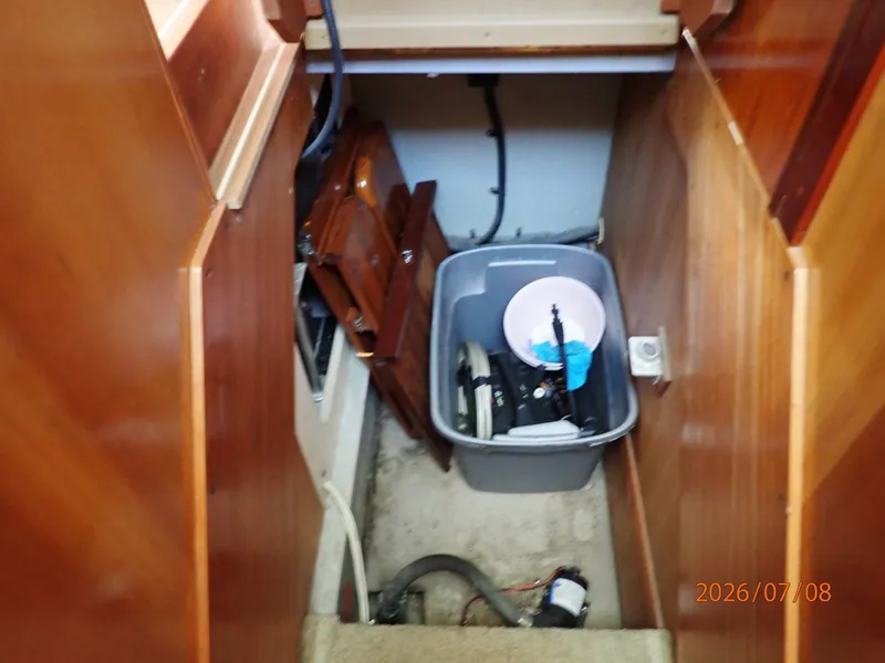 Slide: The Image of 40' Mainship companionway storage - 6848093