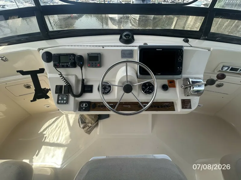 Slide: The Image of 40' Mainship flybridge helm3 - 6848102