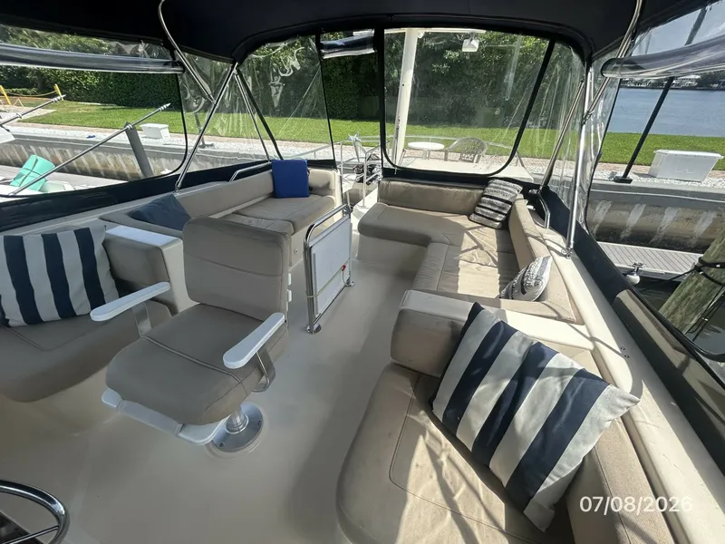 Slide: The Image of 40' Mainship flybridge aft - 6848098