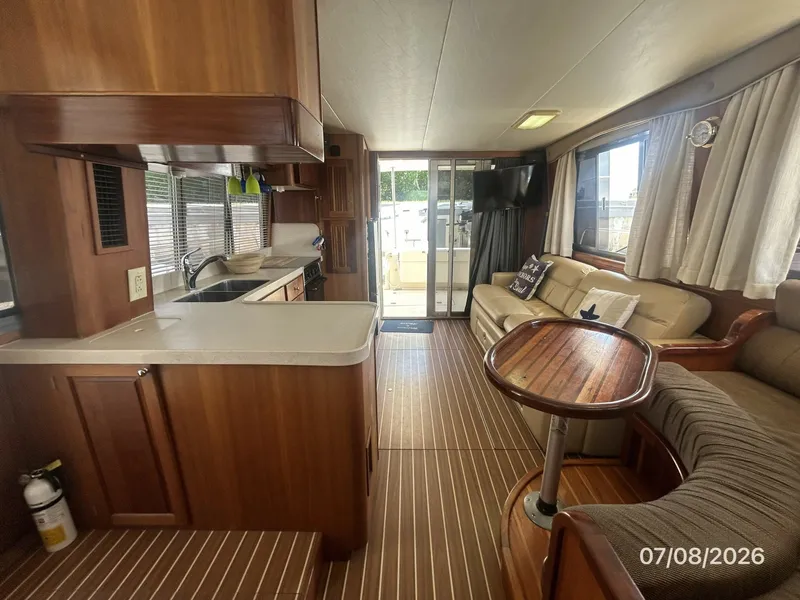 Slide: The Image of 40' Mainship salon aft - 6848139