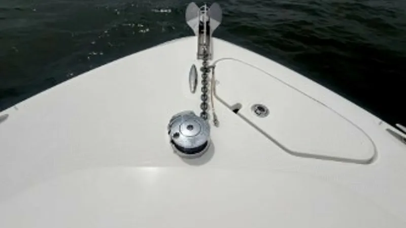 Slide: The Image of Bow Anchor System View The image showcases the bow of the Hydra-Sports 4200 Siesta, highlighting its robust anchor system. The sleek design of the deck complements the polished metal fittings, ensuring both functionality and style. This setup is ideal for secure anchoring, prov - 7030830