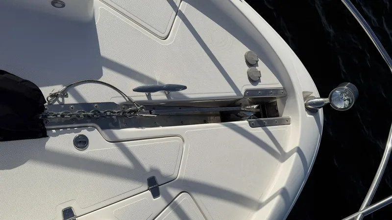 Slide: The Image of Bow Anchor and Chain System The bow of the 2014 Regal 46 Sport Coupe features a robust anchor and chain system, ideal for secure mooring. The clean, non-slip deck surface ensures safety and ease of movement when handling the anchor. Stainless steel fittings and a sleek, modern desig - 6857469