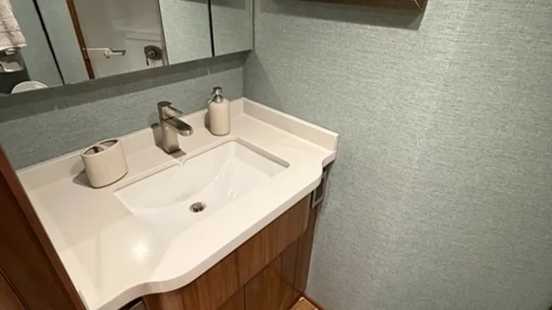 Slide: The Image of Viking 68 Convertible Forward Head Forward Head with mirrored vanity and storage beneath sink - 6862345