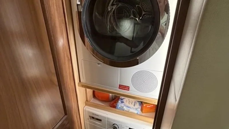 Slide: The Image of 2022 Viking 68 Convertible Washer / Dryer Compact and efficient washer / dryer for easy laundry. - 6862350