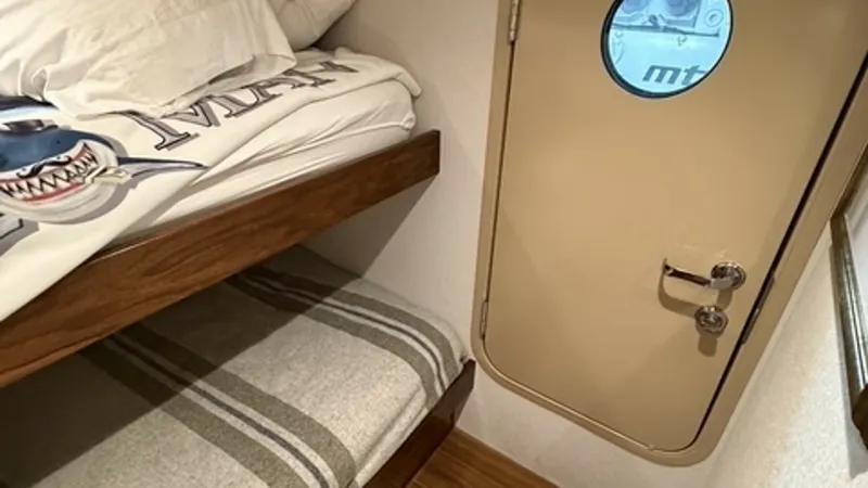 Slide: The Image of 2022 Viking 68 Convertible Crew Stateroom Crew Stateroom Engine Access - 6862355