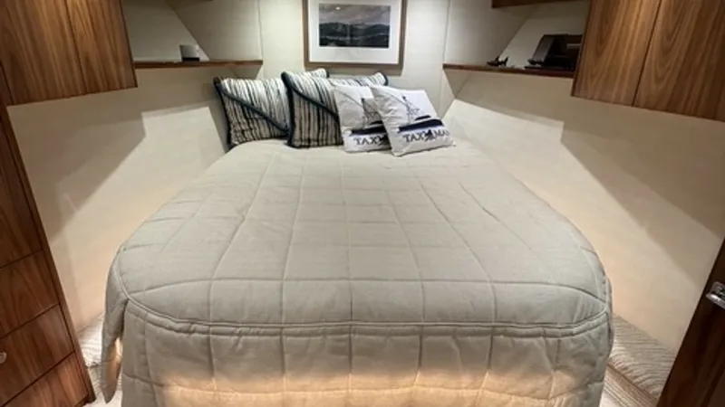 Slide: The Image of Viking 68 Convertible Forward Stateroom Expansive queen-size berth with storage beneath. - 6862341