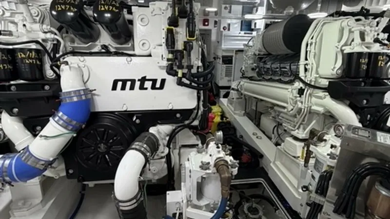 Slide: The Image of 2022 Viking 68 Convertible Engine Room with MTU twin engines. - 6862363