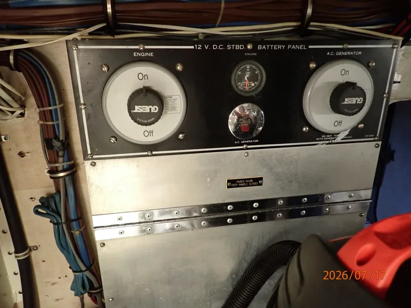Slide: The Image of 48' Hatteras engine room starboard electrical panel - 6885861