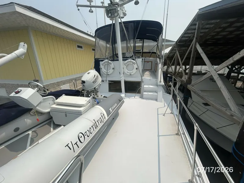 Slide: The Image of 48' Hatteras tender deck forward - 6885937