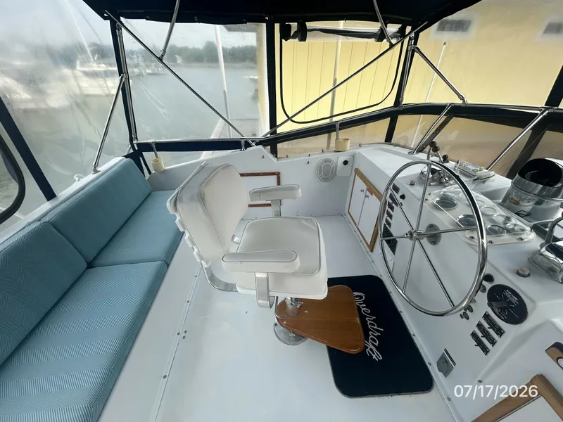 Slide: The Image of 48' Hatteras flybridge port - 6885869