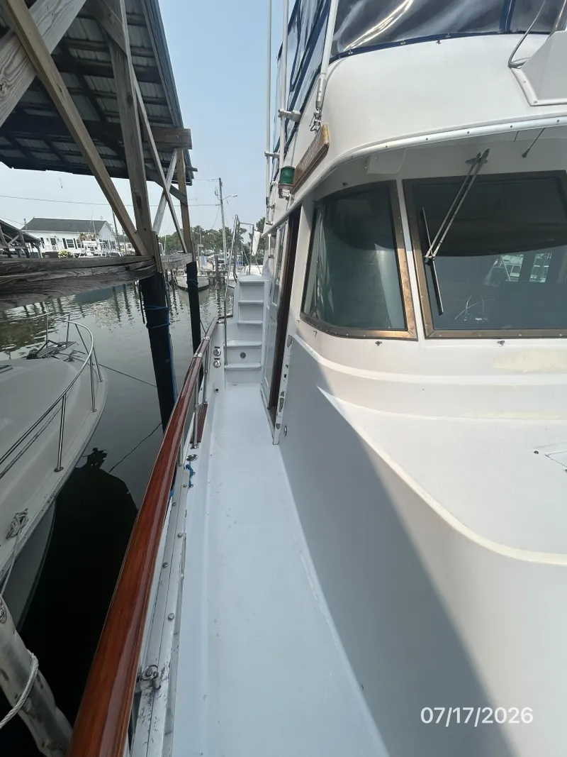 Slide: The Image of 48' Hatteras starboard side deck1 - 6885934