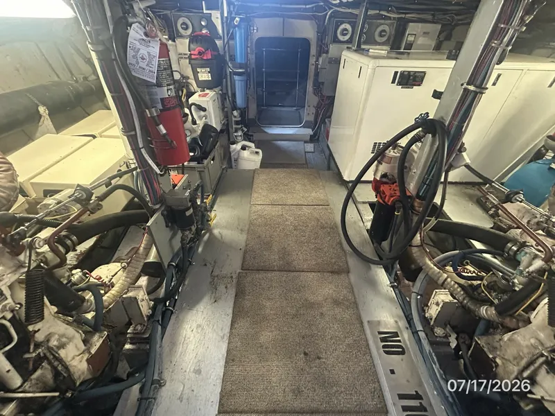 Slide: The Image of 48' Hatteras engine room aft - 6885858