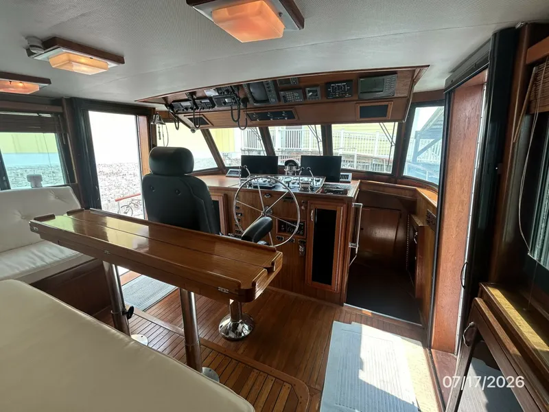 Slide: The Image of 48' Hatteras pilothouse forward - 6885897