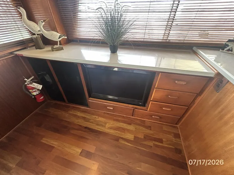 Slide: The Image of 48' Hatteras salon port cabinetry - 6885921