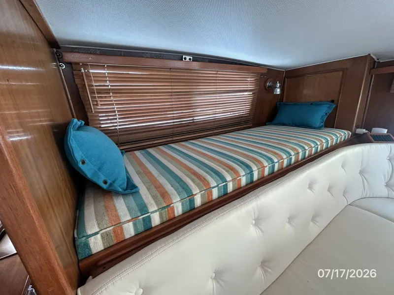 Slide: The Image of 48' Hatteras pilothouse aft berth - 6885896