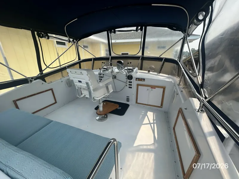 Slide: The Image of 48' Hatteras flybridge forward - 6885864