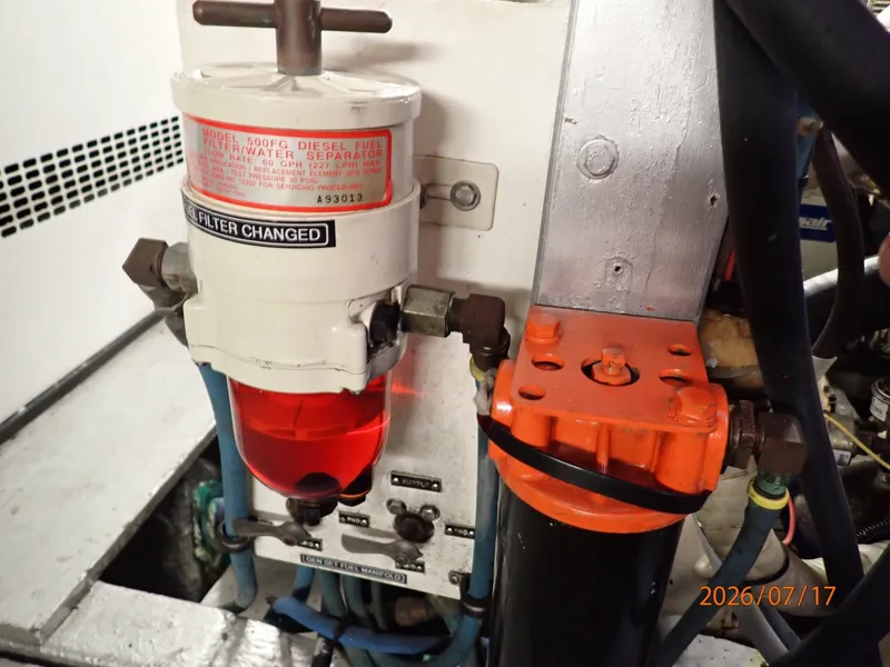 Slide: The Image of 48' Hatteras generator Racor fuel filter - 6885879