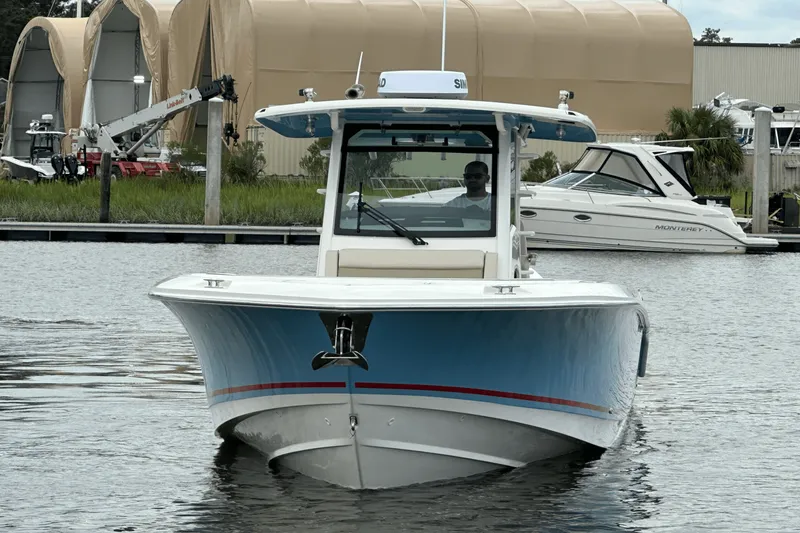 Slide: The Image of Boston Whaler 330 Outrage 2025 - 2