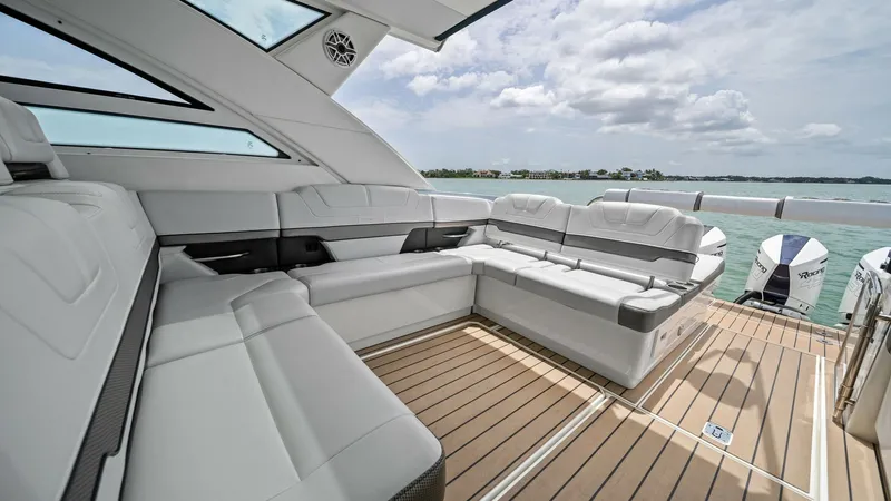 Slide: The Image of Spacious Aft Deck with Seating The aft deck of the 2022 Formula 430 Super Sport Crossover features elegant, wrap-around seating, perfect for socializing and relaxation. The sleek design includes durable, high-quality upholstery and panoramic views, creating an inviting space. The integ - 7030605