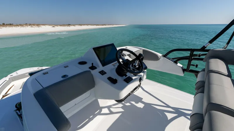 Slide: The Image of Flybridge Helm Station Experience superior control and panoramic views from the flybridge helm of the 2023 Everglades 455 Center Console. The helm features an ergonomic design with state-of-the-art navigation equipment, ensuring a seamless piloting experience. The spacious layo - 7095088