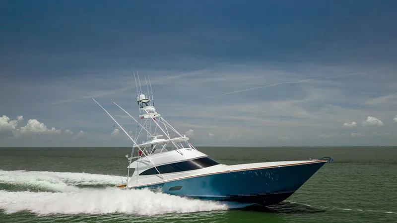 Slide: The Image of Dynamic Bow View at Sea This 2016 Viking 80 Convertible is captured in motion, showcasing its sleek hull slicing through the water with ease. The elegant design features a sharp, aerodynamic bow and a commanding tower, emphasizing its prowess in sportfishing and offshore cruisin - 7150220