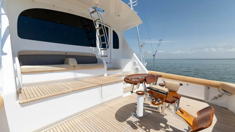 Slide: The Image of Spacious Aft Deck with Fishing Chair This 2016 Viking 80 Convertible features an expansive aft deck perfect for fishing enthusiasts. The area is equipped with a premium fighting chair and ample seating, offering both functionality and comfort. The teak decking and sleek design elements enhan - 7150199