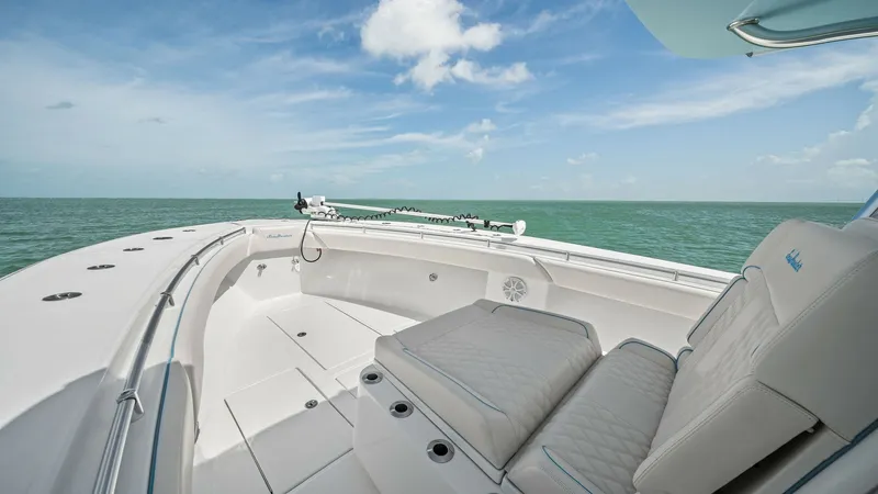 Slide: The Image of Spacious Bow Seating Area The 2024 Sea Hunter 35 Tournament features a luxurious bow seating area, perfect for relaxing and enjoying the views. Plush, cushioned seats provide comfort, while the clean, modern design enhances the aesthetic appeal. This space is ideal for both leisur - 7094871