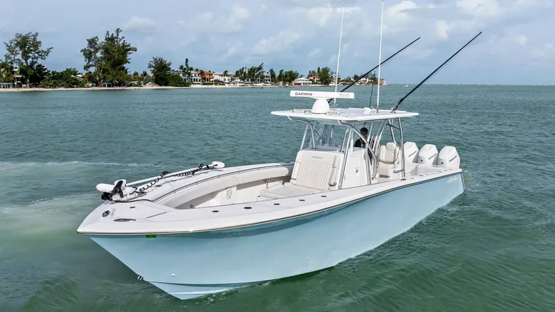 Slide: The Image of Bow and Console View The 2024 Sea Hunter 35 Tournament features a sleek bow with ample seating and storage, perfect for both relaxation and fishing. The central console is equipped with advanced navigation systems and provides excellent visibility for the captain. This model' - 7094878