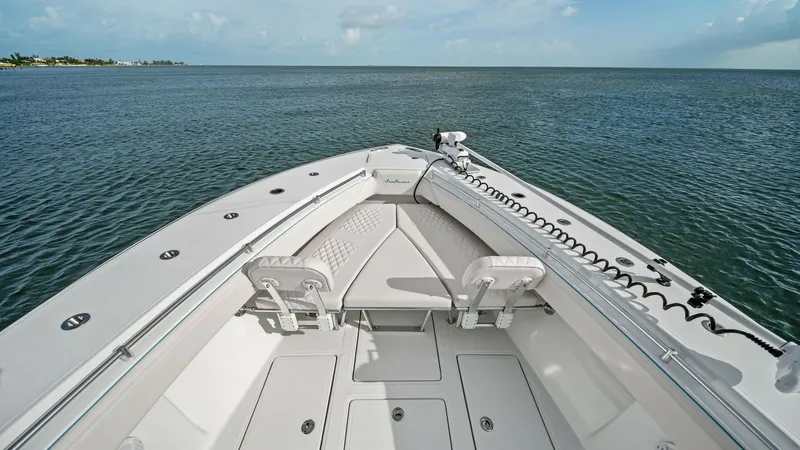 Slide: The Image of Spacious Bow with Seating The 2024 Sea Hunter 35 Tournament features an expansive bow area designed for both relaxation and functionality. Equipped with comfortable seating and ample storage, this area is perfect for lounging or preparing for a day of fishing. The sleek design and - 7094860