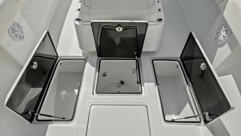 Slide: The Image of Aft Deck with Storage Compartments The 2024 Sea Hunter 35 Tournament features a spacious aft deck equipped with multiple storage compartments, ideal for keeping your gear organized and secure. The sleek, modern design is complemented by durable materials and a streamlined layout, ensuring - 7094876