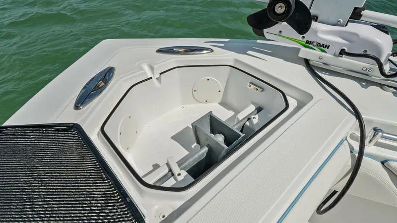 Slide: The Image of Bow Anchor Locker with Trolling Motor This image showcases the bow anchor locker of the 2024 Sea Hunter 35 Tournament. The spacious compartment is designed for easy access and efficient storage of anchor equipment. The integrated trolling motor adds enhanced maneuverability, making it ideal f - 7094875
