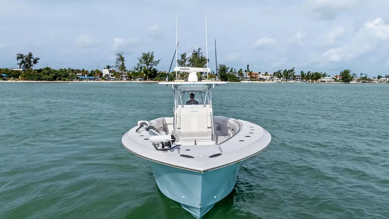 Slide: The Image of Bow View of 2024 Sea Hunter 35 This image showcases the sleek bow of the 2024 Sea Hunter 35 Tournament, designed for optimal performance and style. The open deck layout prominently features a spacious area perfect for fishing or relaxing, complemented by durable, high-quality finishes. - 7094880