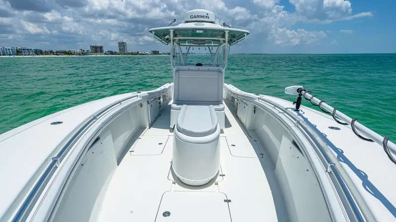 Slide: The Image of Spacious Bow with Seating The 2021 Yellowfin 36 Offshore features a spacious bow area with comfortable seating, perfect for relaxing and enjoying the open water. The clean, sleek lines of the deck highlight its high-quality, durable construction, while the integrated storage solut - 7150867
