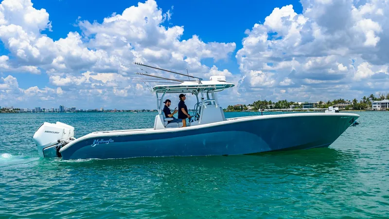 The Image of Profile of Yellowfin 36 Offshore The 2021 Yellowfin 36 Offshore showcases a sleek, streamlined hull designed for performance and efficiency on the water. Its spacious center console layout allows for easy movement and access to fishing gear. The powerful engines provide impressive speed, - 7150863