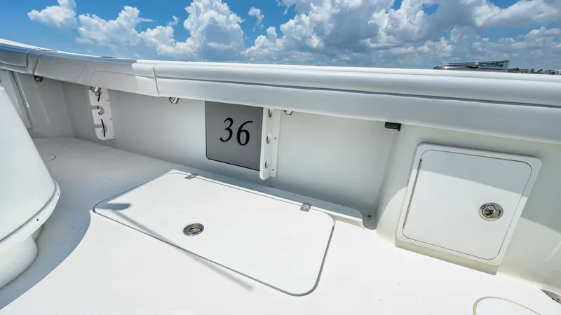 Slide: The Image of Spacious Aft Deck with Storage The aft deck of the 2021 Yellowfin 36 Offshore offers ample space for fishing or leisure activities. Featuring built-in storage compartments, this area is designed for functionality and convenience, ensuring all your gear is safely stowed. The clean, whit - 7150884