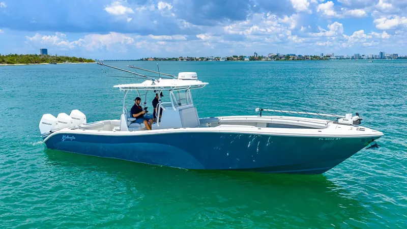 Slide: The Image of Side Profile of 2021 Yellowfin 36 Offshore This striking side profile of the 2021 Yellowfin 36 Offshore showcases its sleek, aerodynamic hull designed for high performance in open waters. The spacious deck layout is ideal for both serious anglers and leisure seekers, featuring a center console wit - 7150874