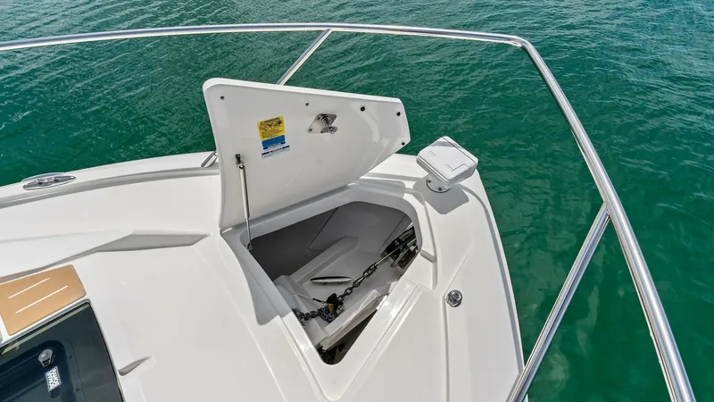 Slide: The Image of Bow Anchor Locker The Tiara Yachts 48LE features a well-designed bow anchor locker, providing easy access with a sturdy hatch. The clean lines and ample storage space ensure efficient anchor management, enhancing both functionality and aesthetics. The stainless steel raili - 7403622