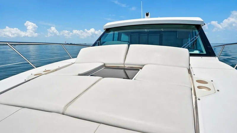 Slide: The Image of Spacious Bow Sunpad This image showcases the expansive bow sunpad of the 2025 Regal 38 EXC, providing ample space for relaxation under the sun. The sleek lines and elegant design enhance the vessel's modern aesthetics, complemented by durable materials for long-lasting comfo - 7180460